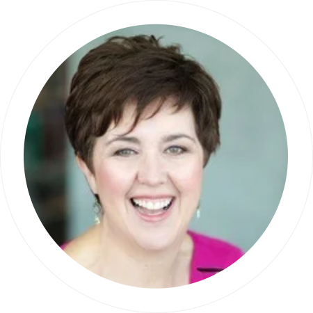 Photo of Bev smiling.