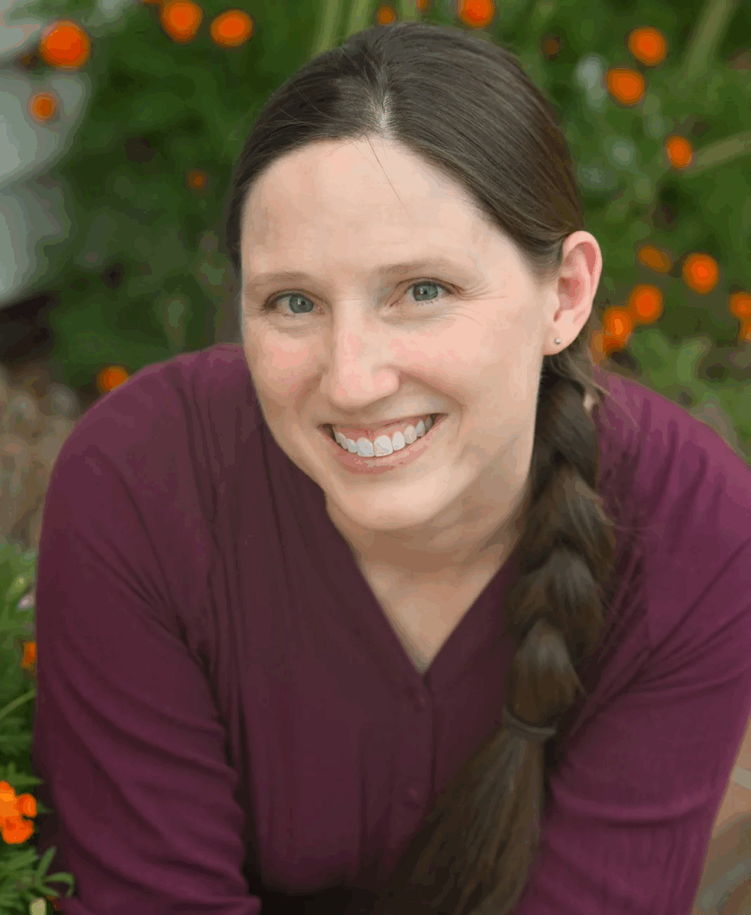 Photo of Christina smiling.